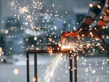 process-of-welding-factory-male-worker-in-uniform-is-indoors.jpg